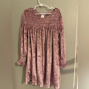 Pink long sleeve casual dress with smocked bodice and gathered cuffs